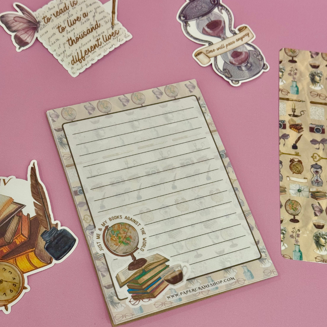 Notebook with decorative elements on a pink background