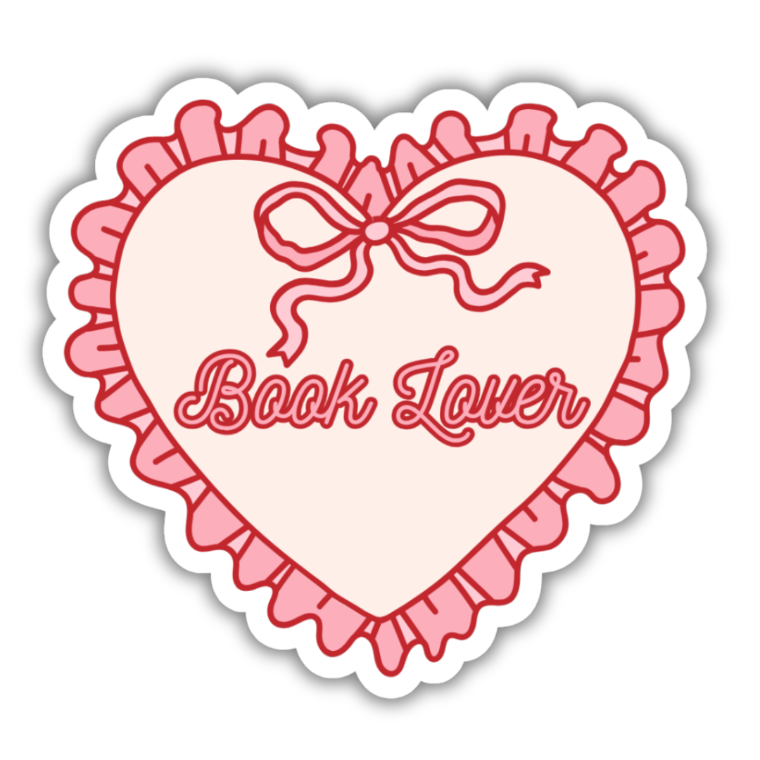 Heart-shaped sticker with a bow and 'Book Lover' text on a white background