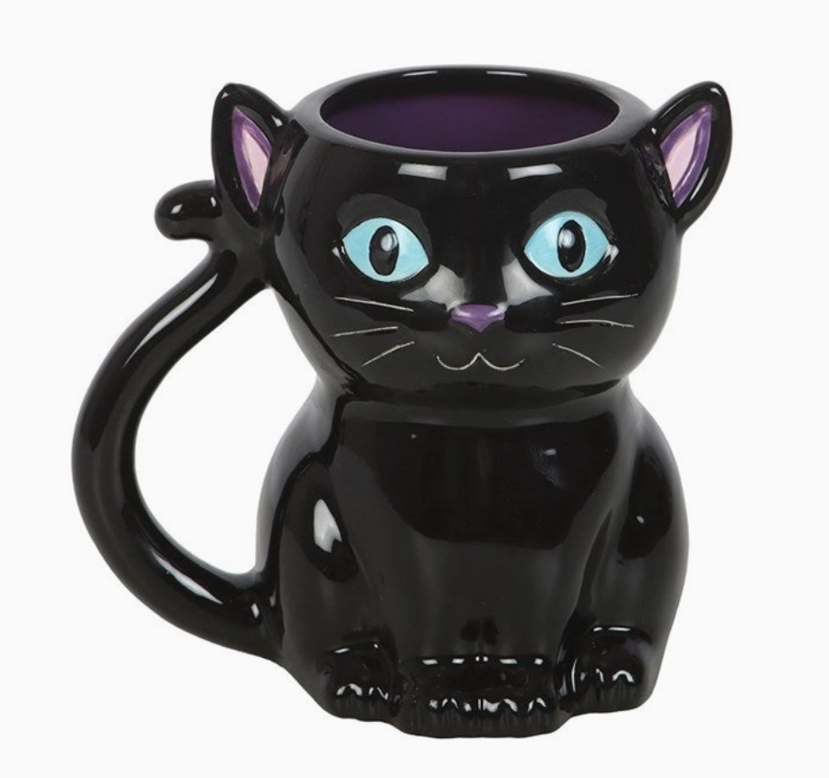 Black cat-shaped mug with blue eyes on a white background