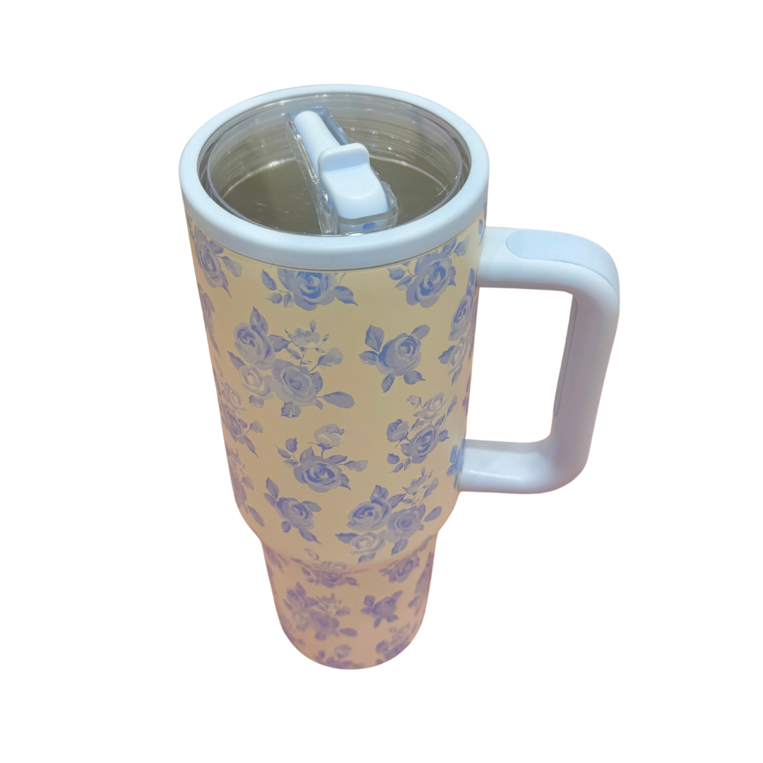 Floral-patterned mug with a handle on a white background