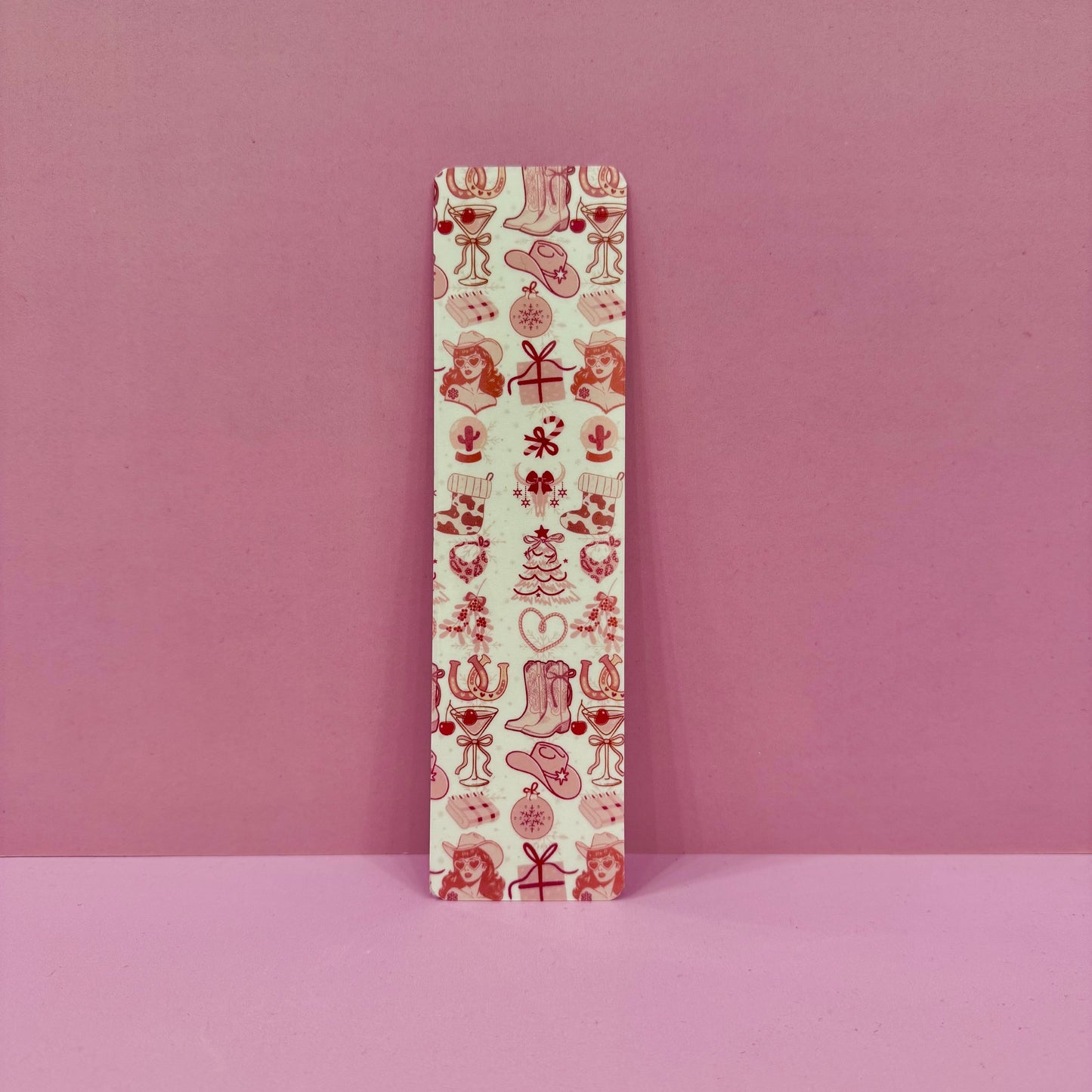 Rectangular bookmark with festive pattern on a pink background