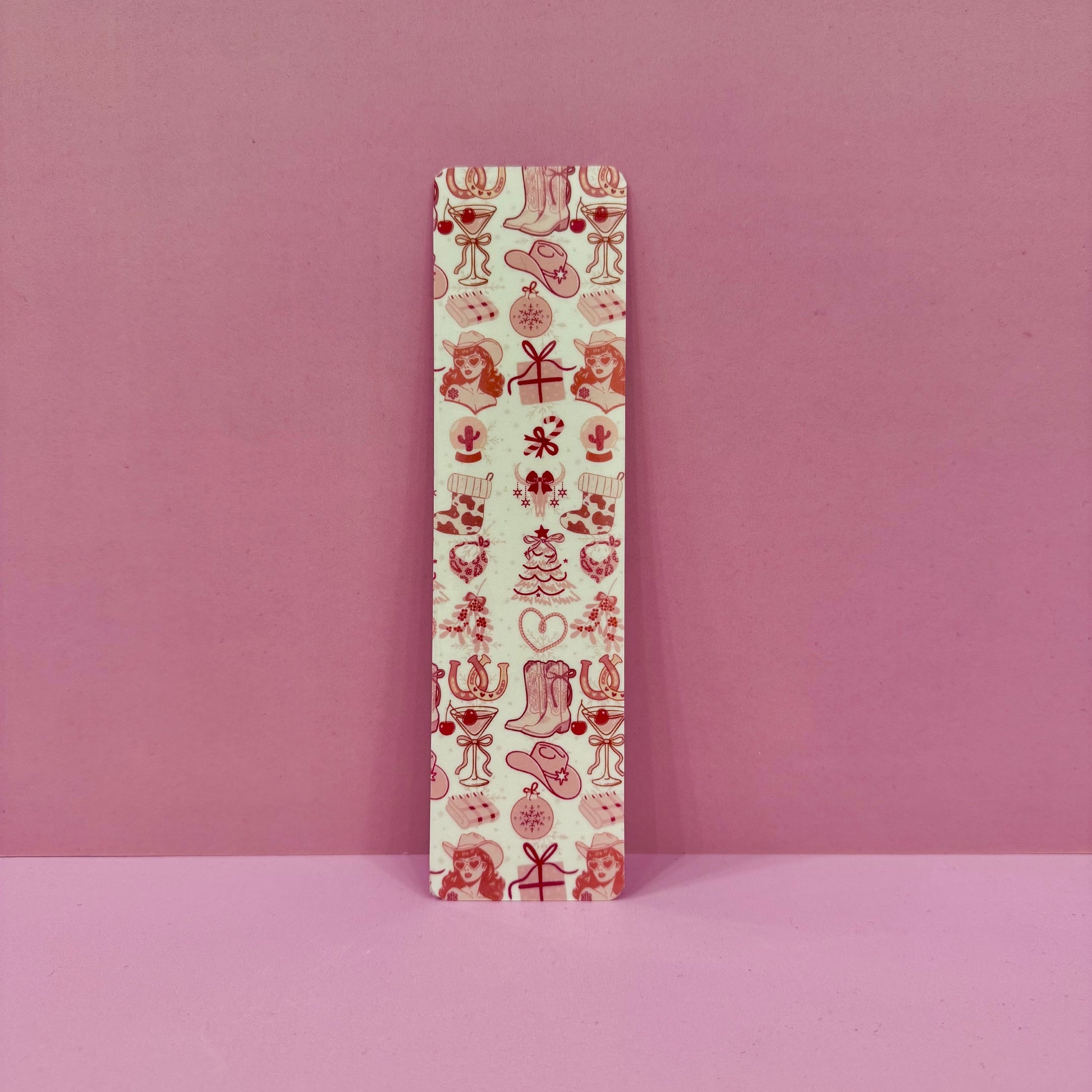 Rectangular bookmark with festive pattern on a pink background