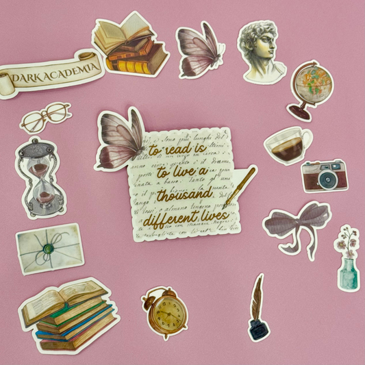 Collection of decorative stickers on a pink background