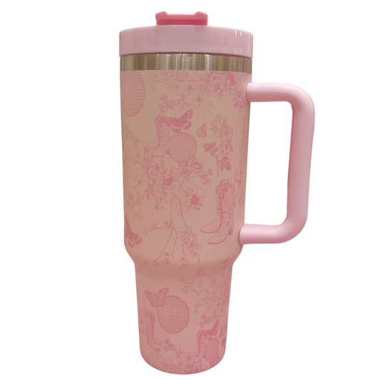 Pink travel mug with floral pattern on a white background