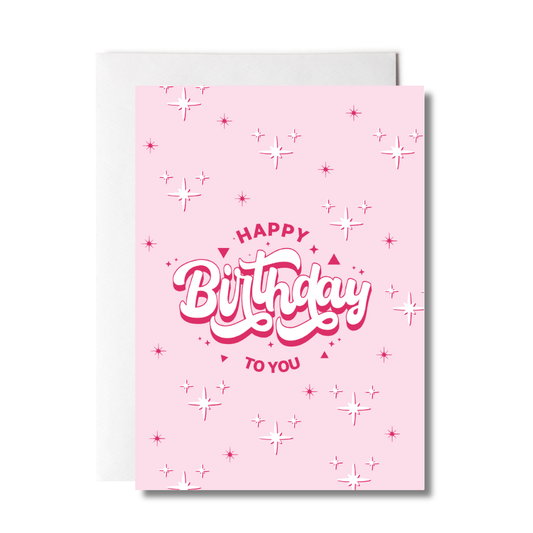 Pink birthday card with 'Happy Birthday to You' text and star patterns on a white background