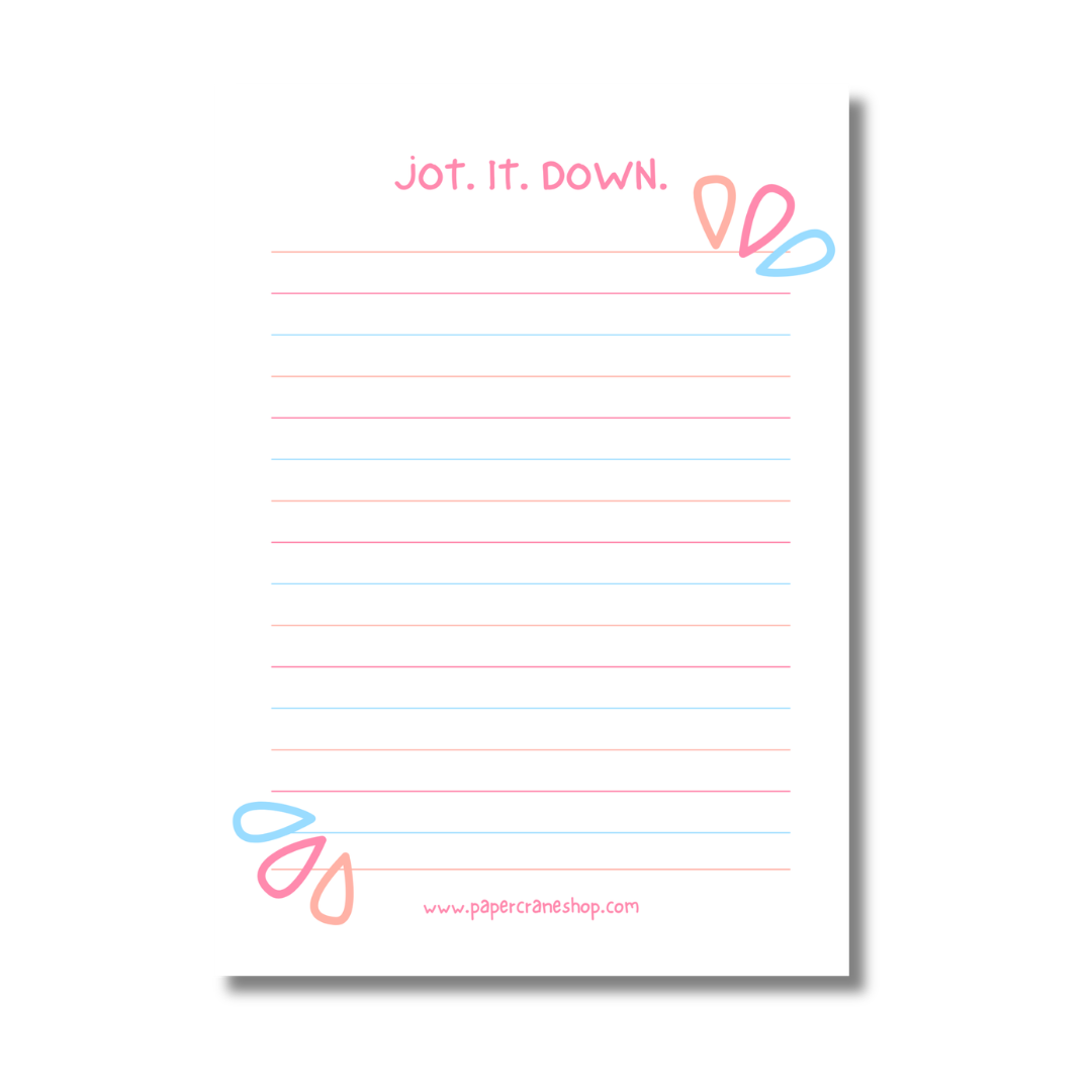 Lined notepad with 'Jot. It. Down.' text and colorful design on a white background