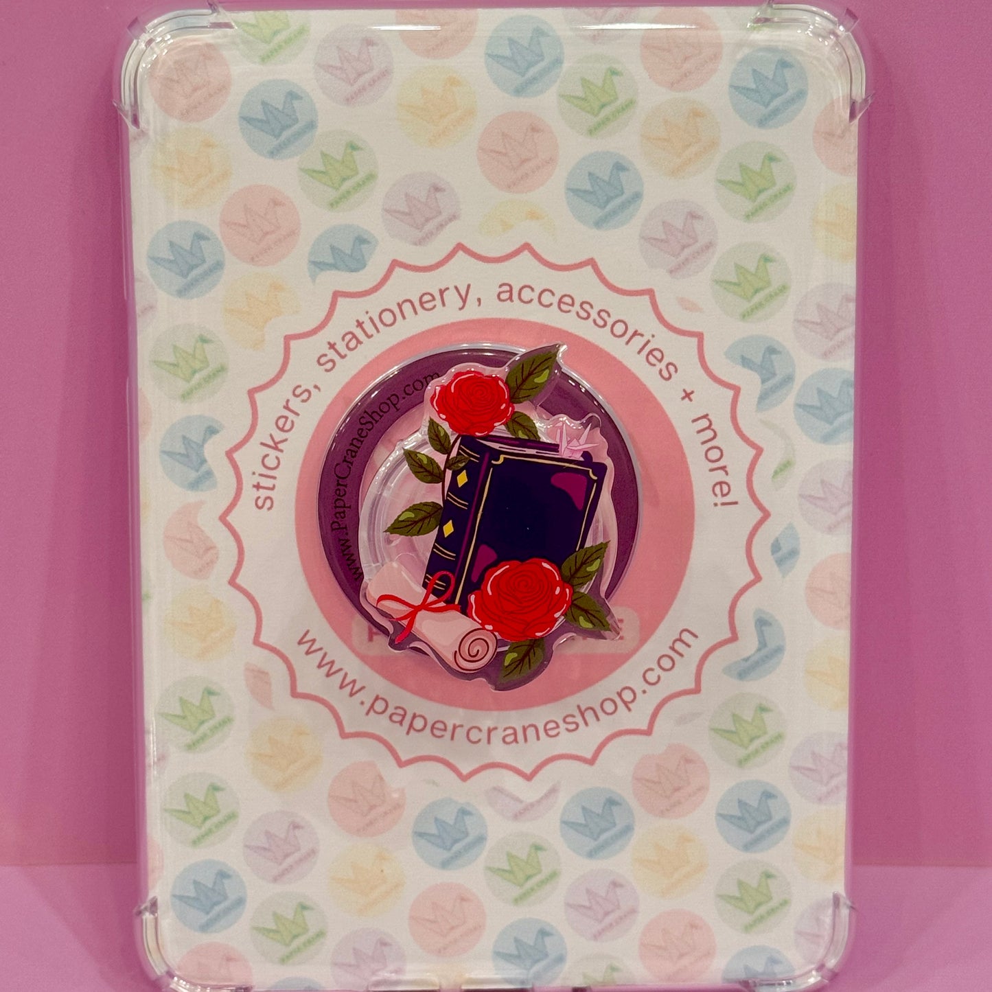 magsage grip with purple books and red roses