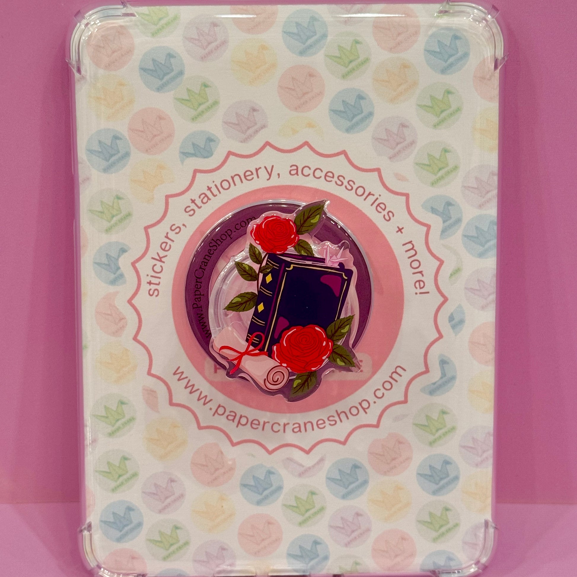 magsage grip with purple books and red roses