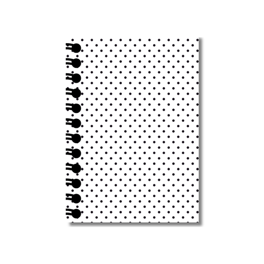 Notebook with black polka dot pattern on white background