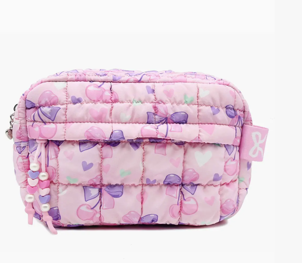 Pink quilted pouch with bow pattern on a white background