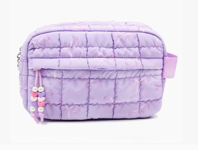 Purple quilted pouch with heart-shaped zipper pulls on a white background