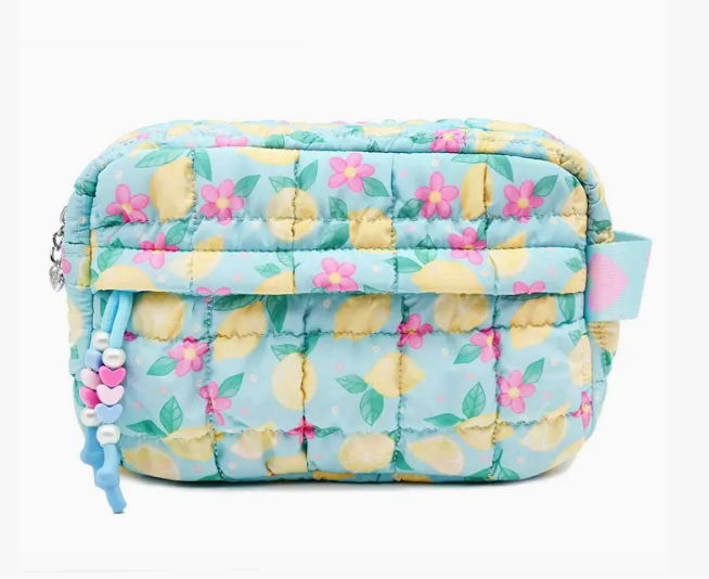 Quilted pouch with lemon and flower pattern on a light blue background