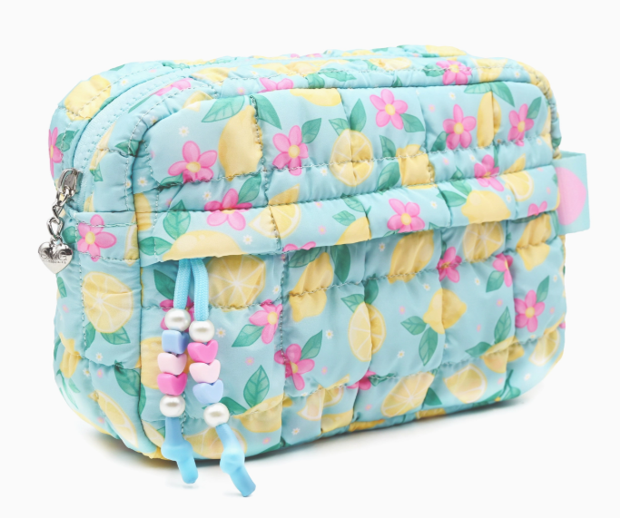 Floral and lemon patterned bag with a drawstring on a white background