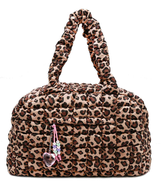 quilted medium duffle bag with bag charms and a leopard print pattern