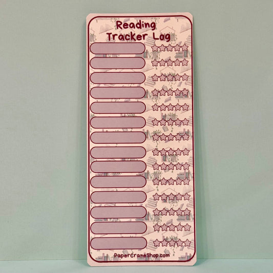 Reading tracker log with star and line designs on a light blue background