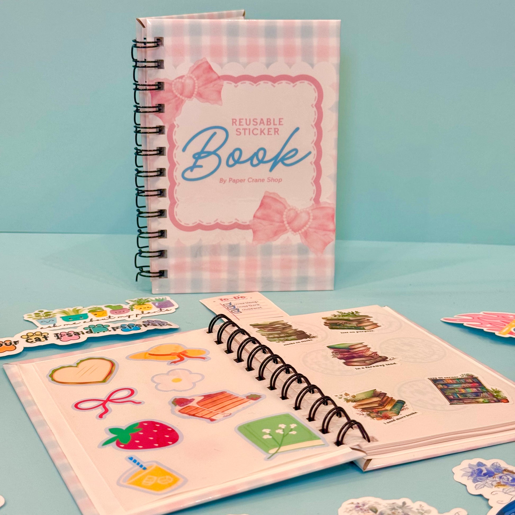 Reusable sticker book with colorful stickers on a blue background