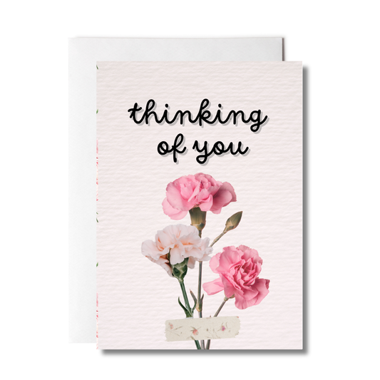 greeting card with the words thinking of you with flowers