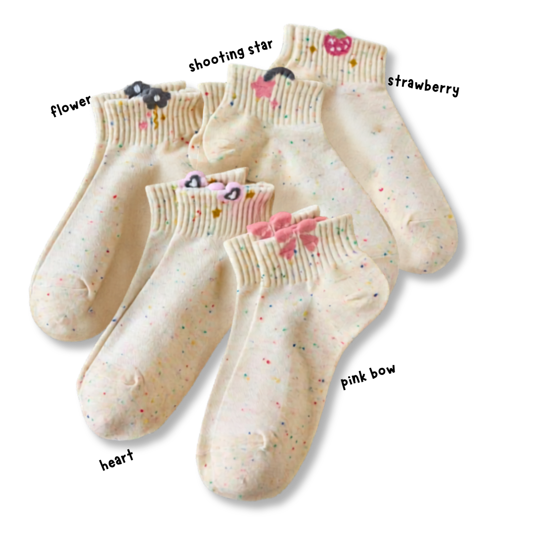 Set of five socks with decorative elements on a white background