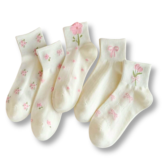 pairs of socks with different pink floral designs