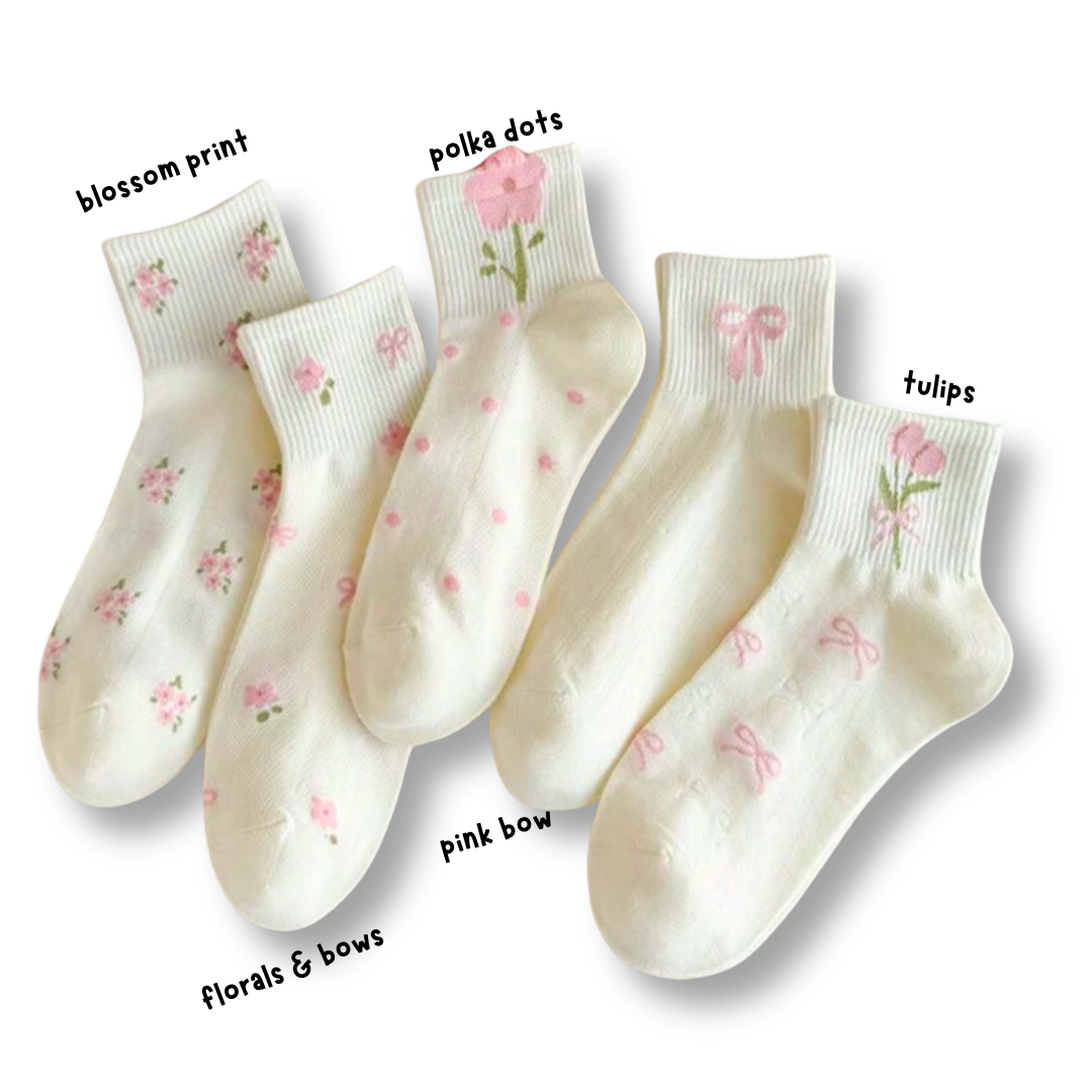 pairs of socks with different pink floral designs