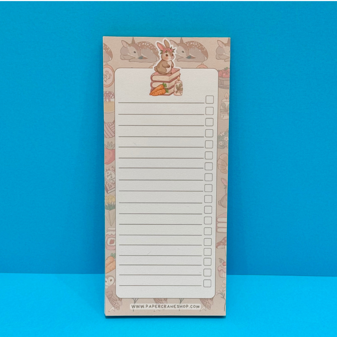 Notepad with cartoon animals on a blue background